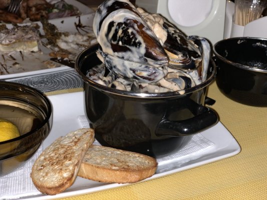 Мидии в сливочно чесночном соусе